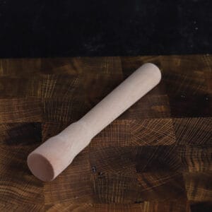 a wooden cocktail muddler